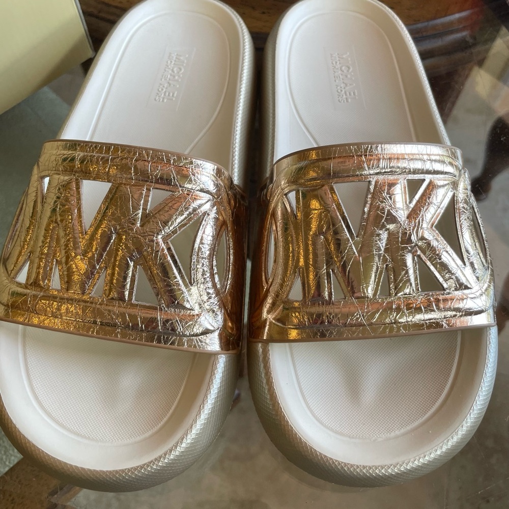 Michael Kors Splash Metallic Gold Leather Slide. Dillards